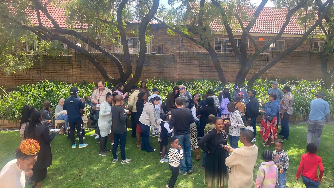 Church members serving their community through outreach activities