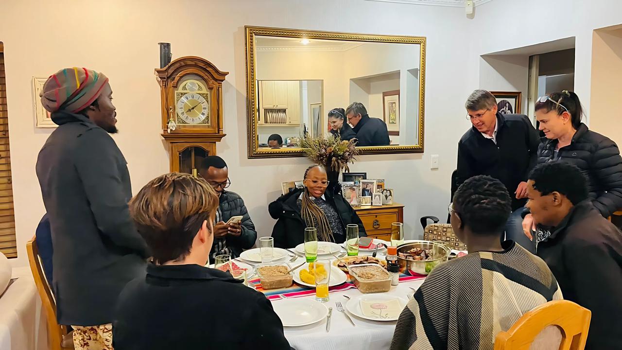 Diverse church members in small group fellowship and Bible study